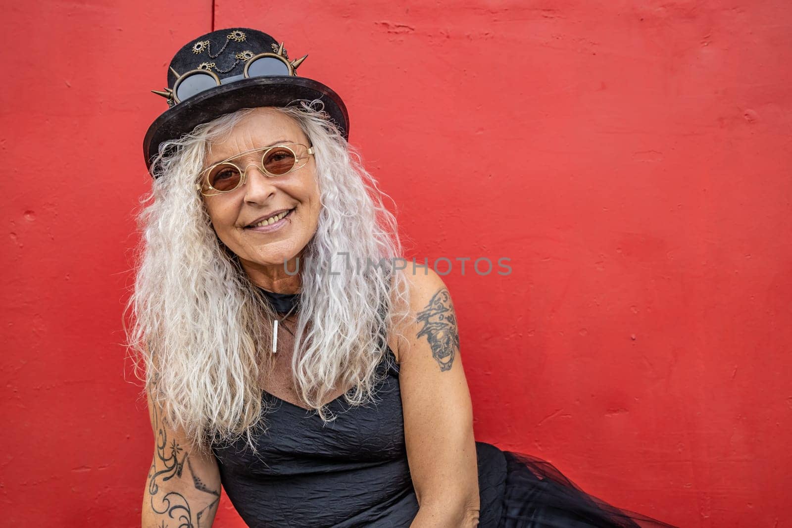 Portrait from beautiful Steampunk Lady with red background