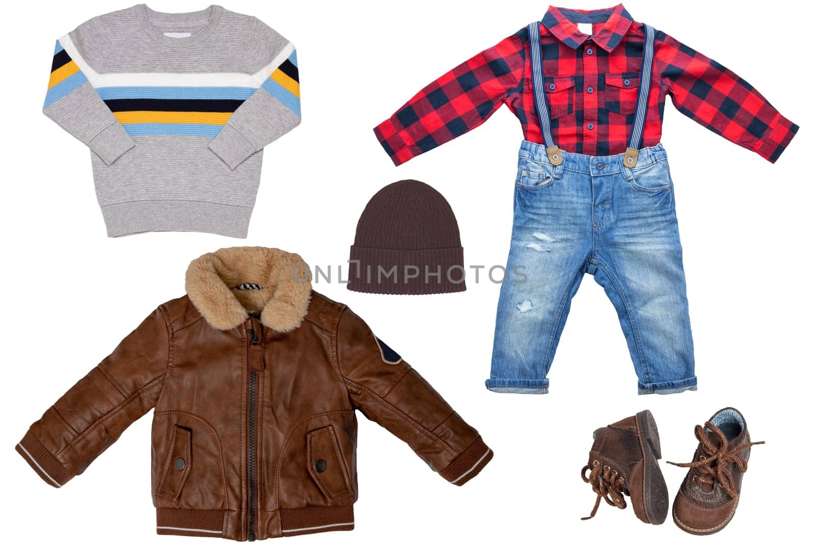Collage set of little boy autumn clothing isolated on a white background. Denim trouser with plaid shirt, a pair shoes, a leather jacket and pullover or sweater for child boy. Kids winter fashion.