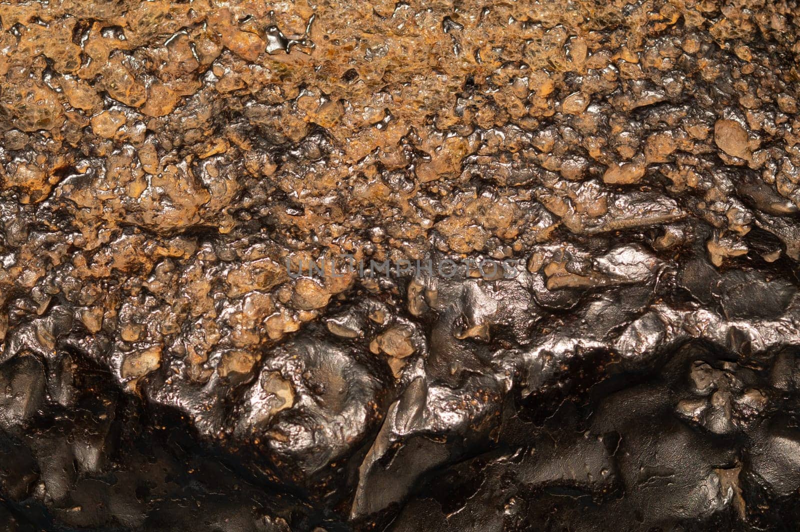 Meteorite texture background. meteorite surface close up. stone backdrop