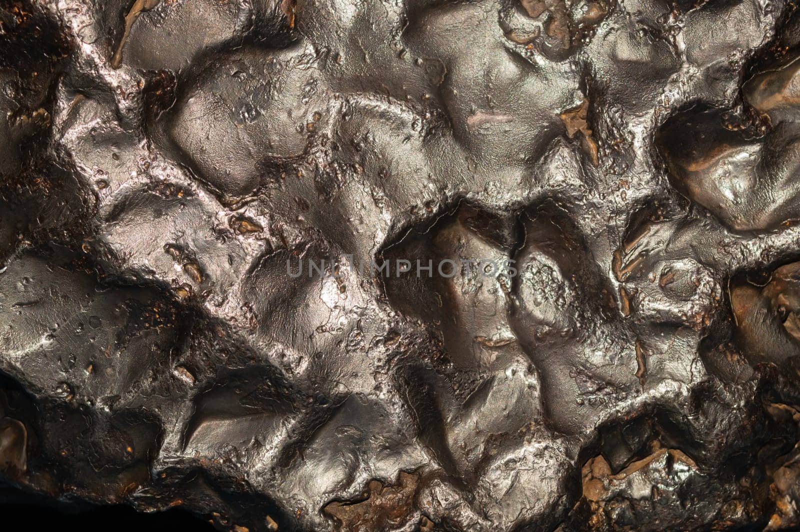 Meteorite texture background. meteorite surface close up. stone backdrop