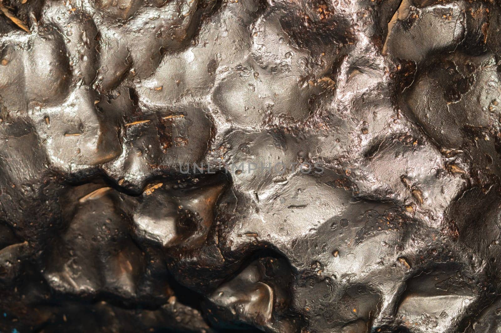 Meteorite texture background. meteorite surface close up. stone backdrop