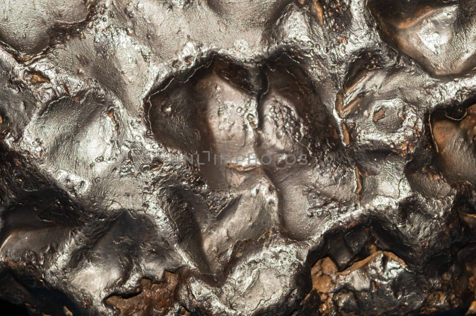 Meteorite texture background. meteorite surface close up. stone backdrop