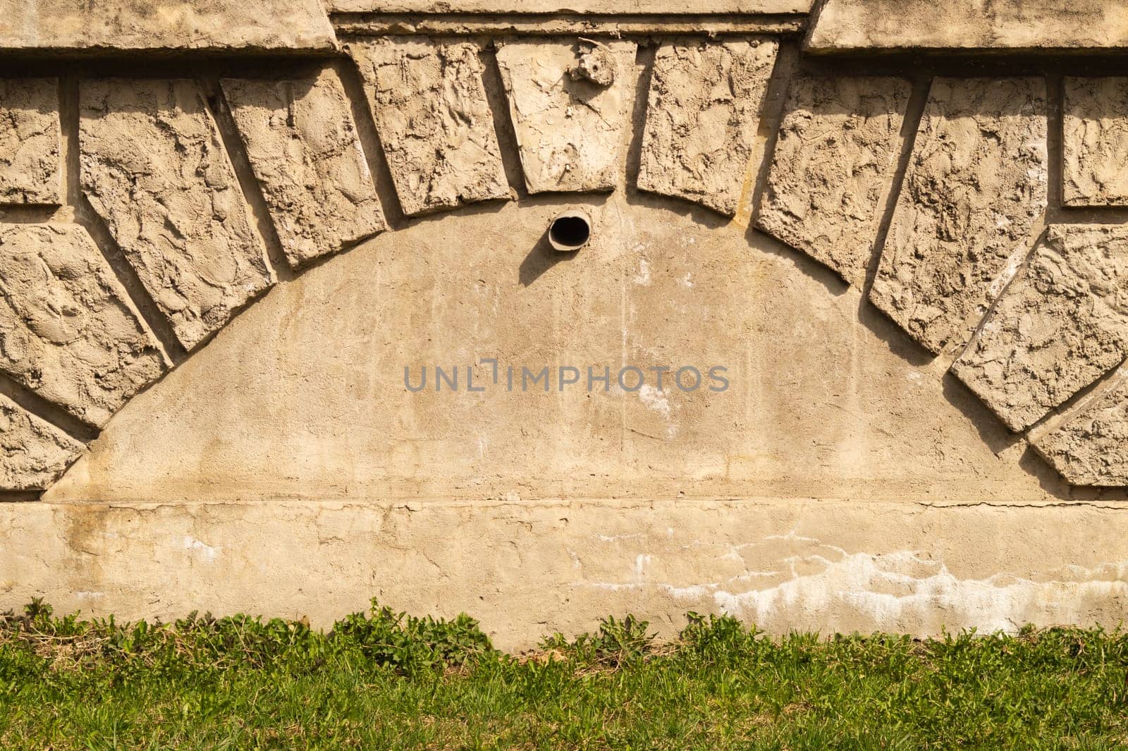 Old brick wall background with copy space. wall from squared bricks. cracked stone wall texture