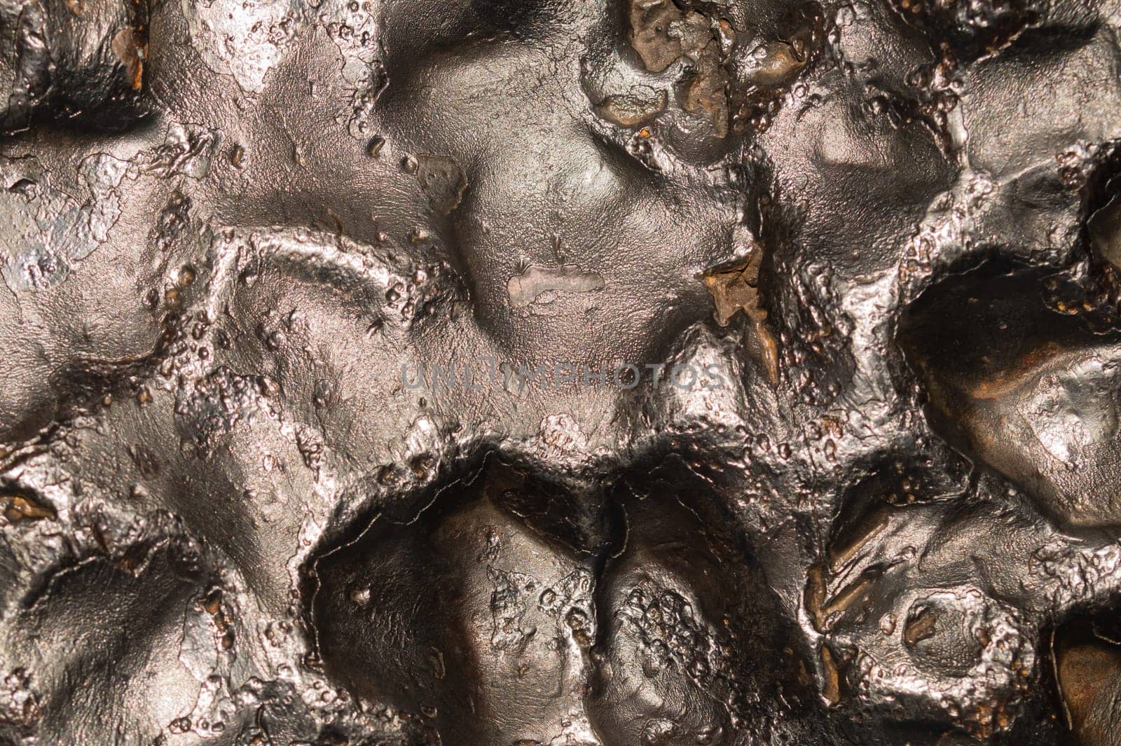 Meteorite texture background. meteorite surface close up. stone backdrop