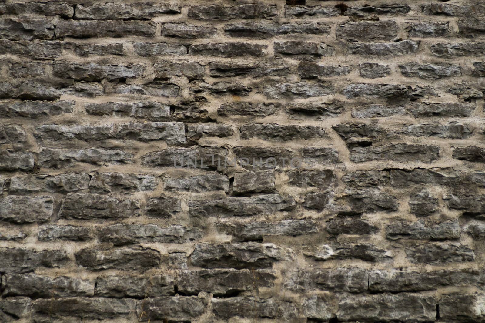 Stone wall background. abstract gray grunge texture. rocky brick wall masonry