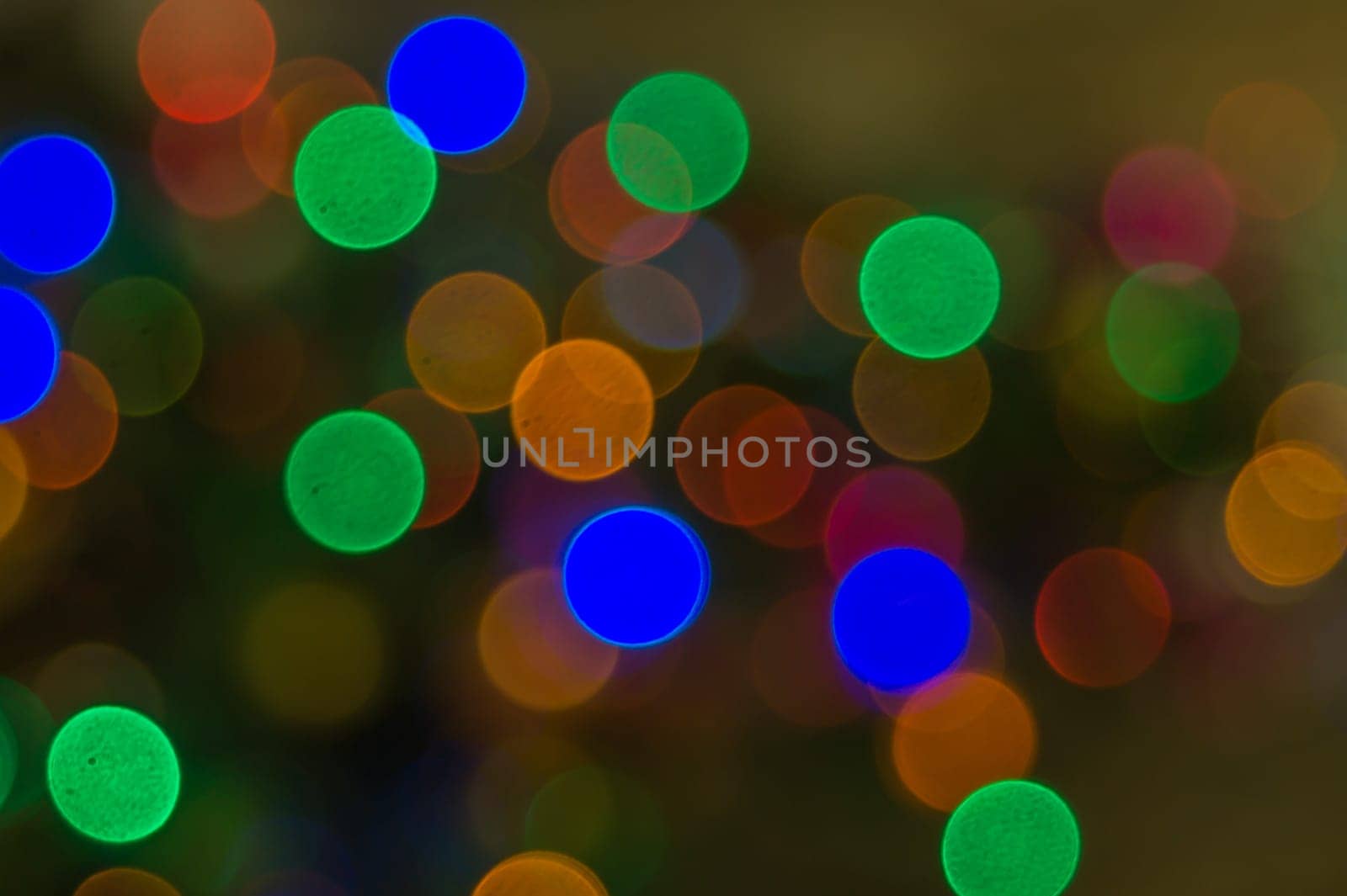 Abstract colorful bokeh defocused lights. holiday background