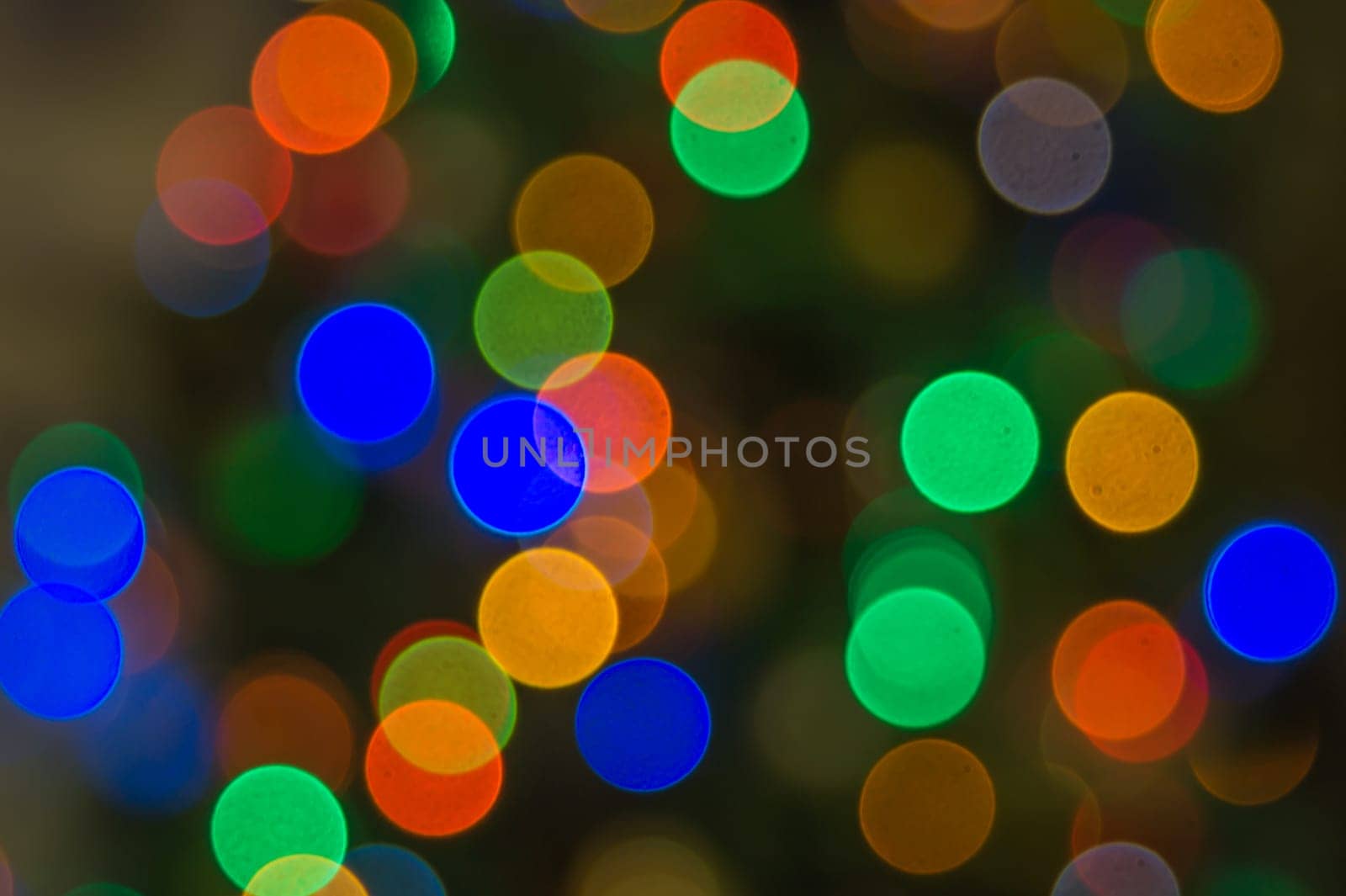 Abstract colorful bokeh defocused lights. holiday background