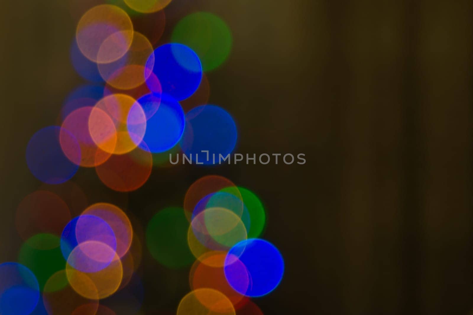 Abstract colorful bokeh defocused lights. holiday background