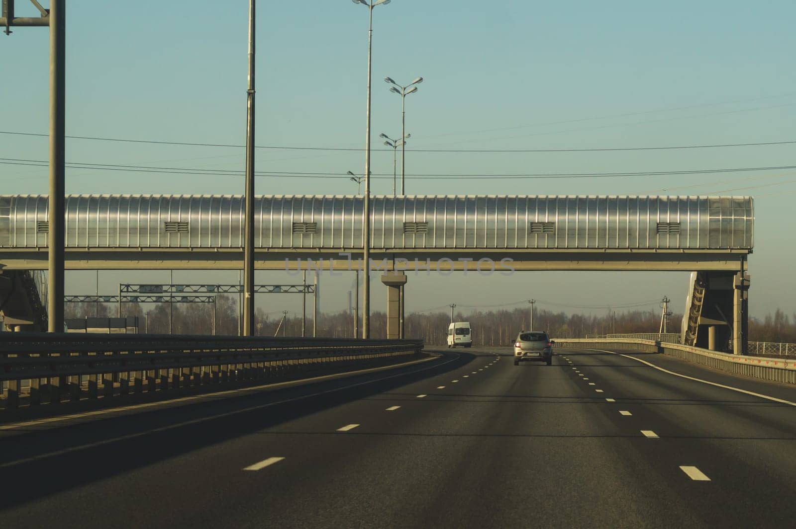Car driving on a highway. auto moving on a roadway background