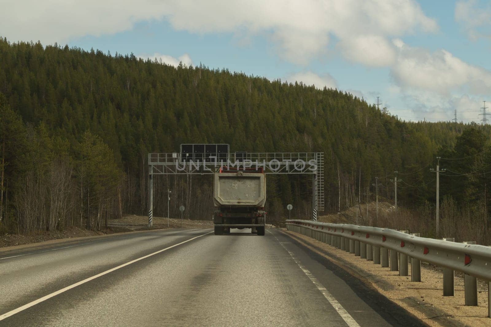 Car driving on a highway. auto moving on a roadway background
