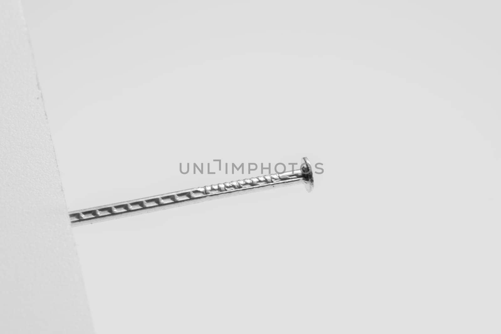 Metal nail isolated on white