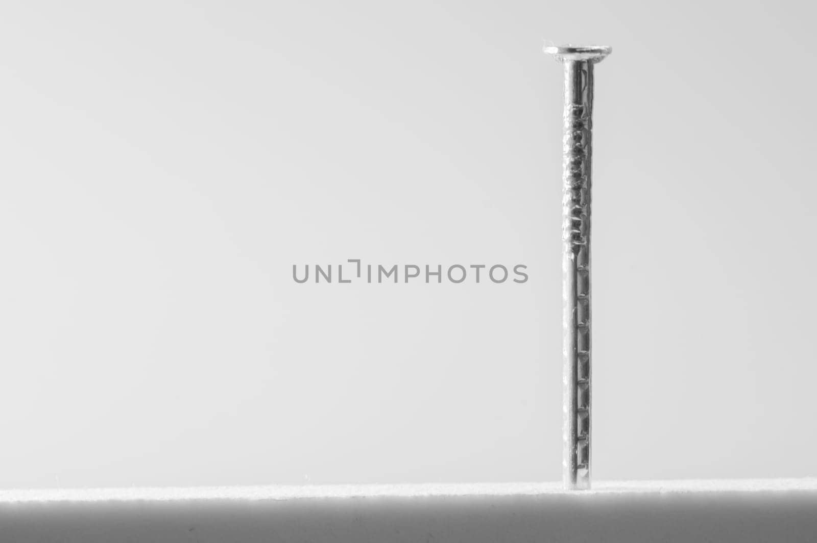 Metal nail isolated on white