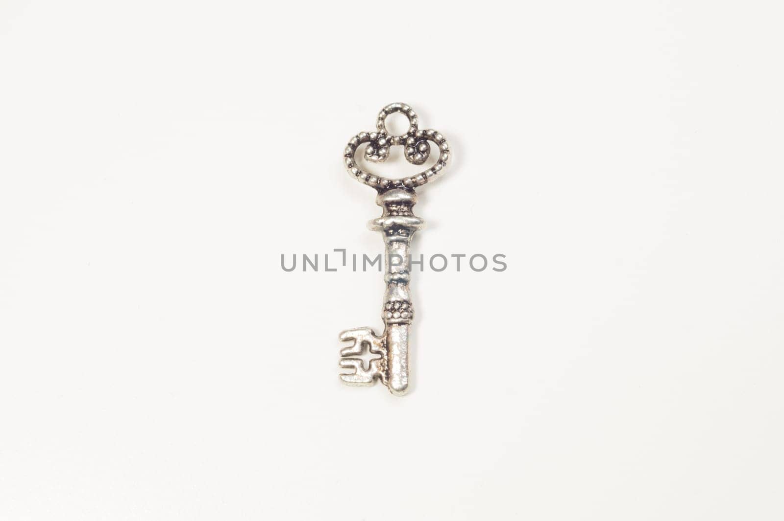 Vintage key isolated on white background. safety and security concept