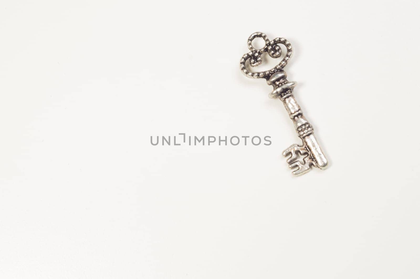 Vintage key isolated on white background. safety and security concept