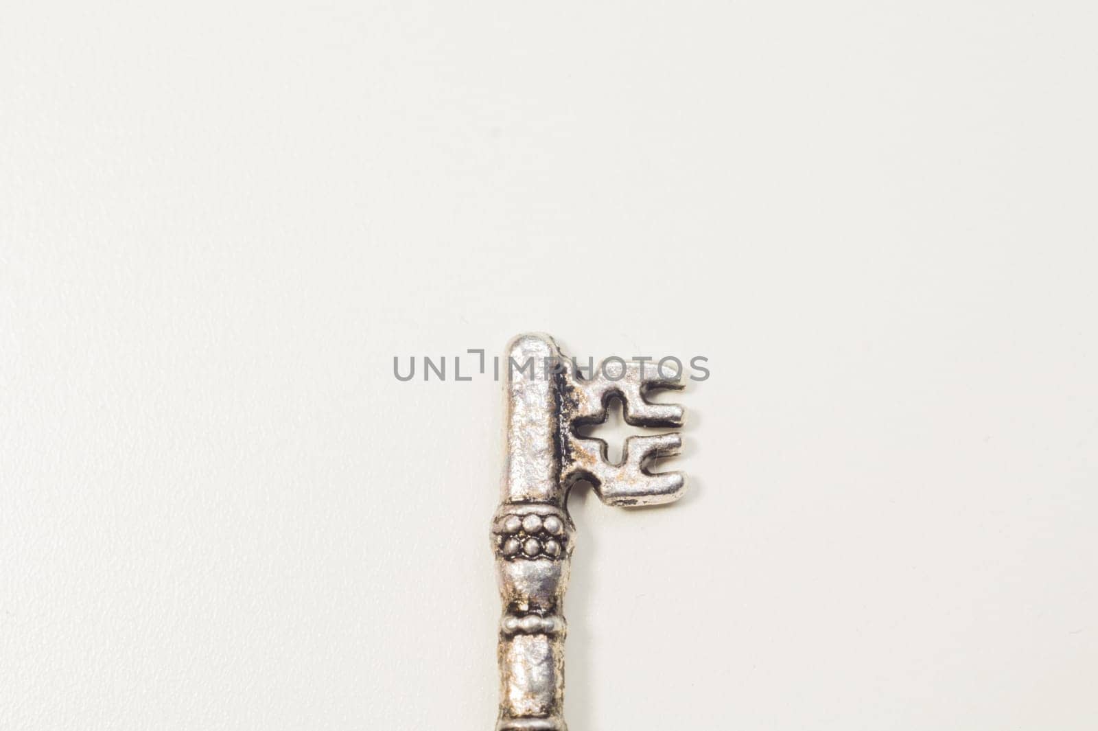 Vintage key isolated on white background. safety and security concept