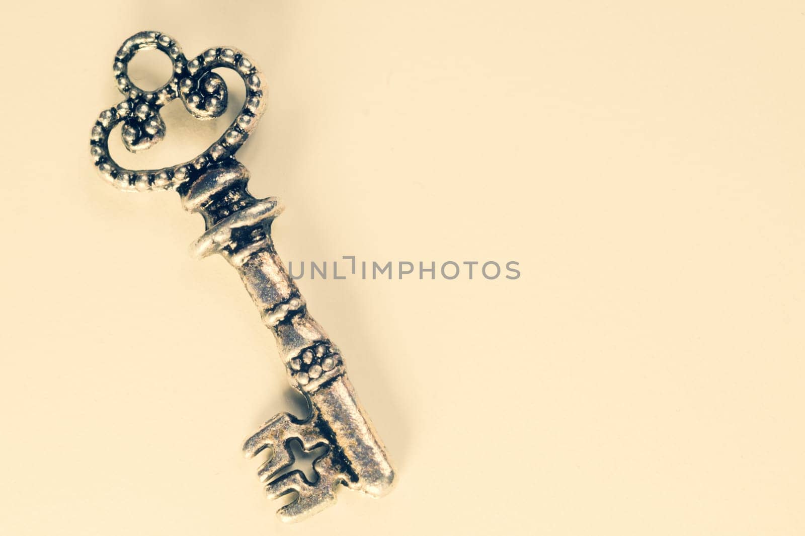 Vintage key isolated on white background. safety and security concept