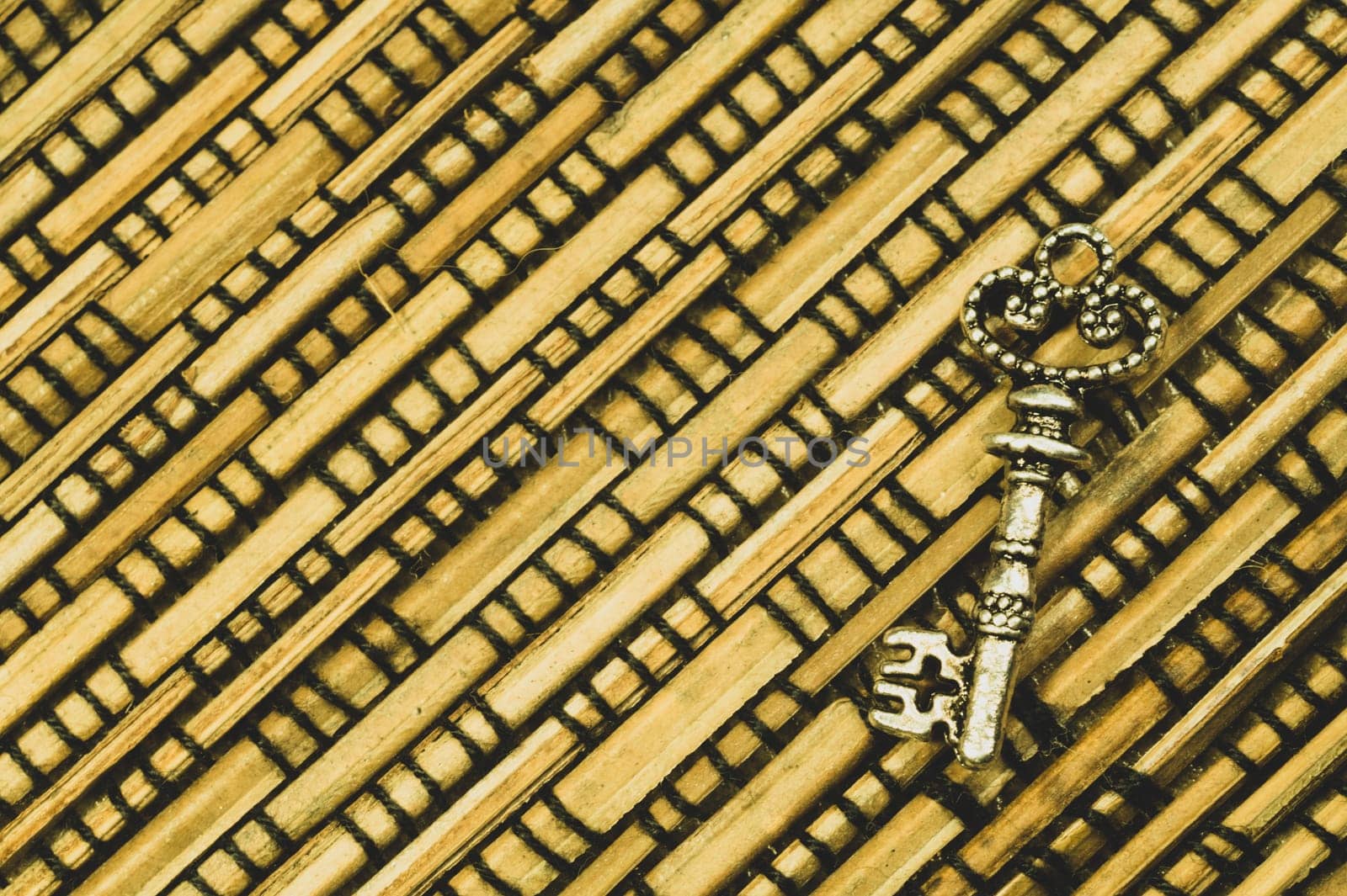 Vintage key on the wooden background. safety and security concept