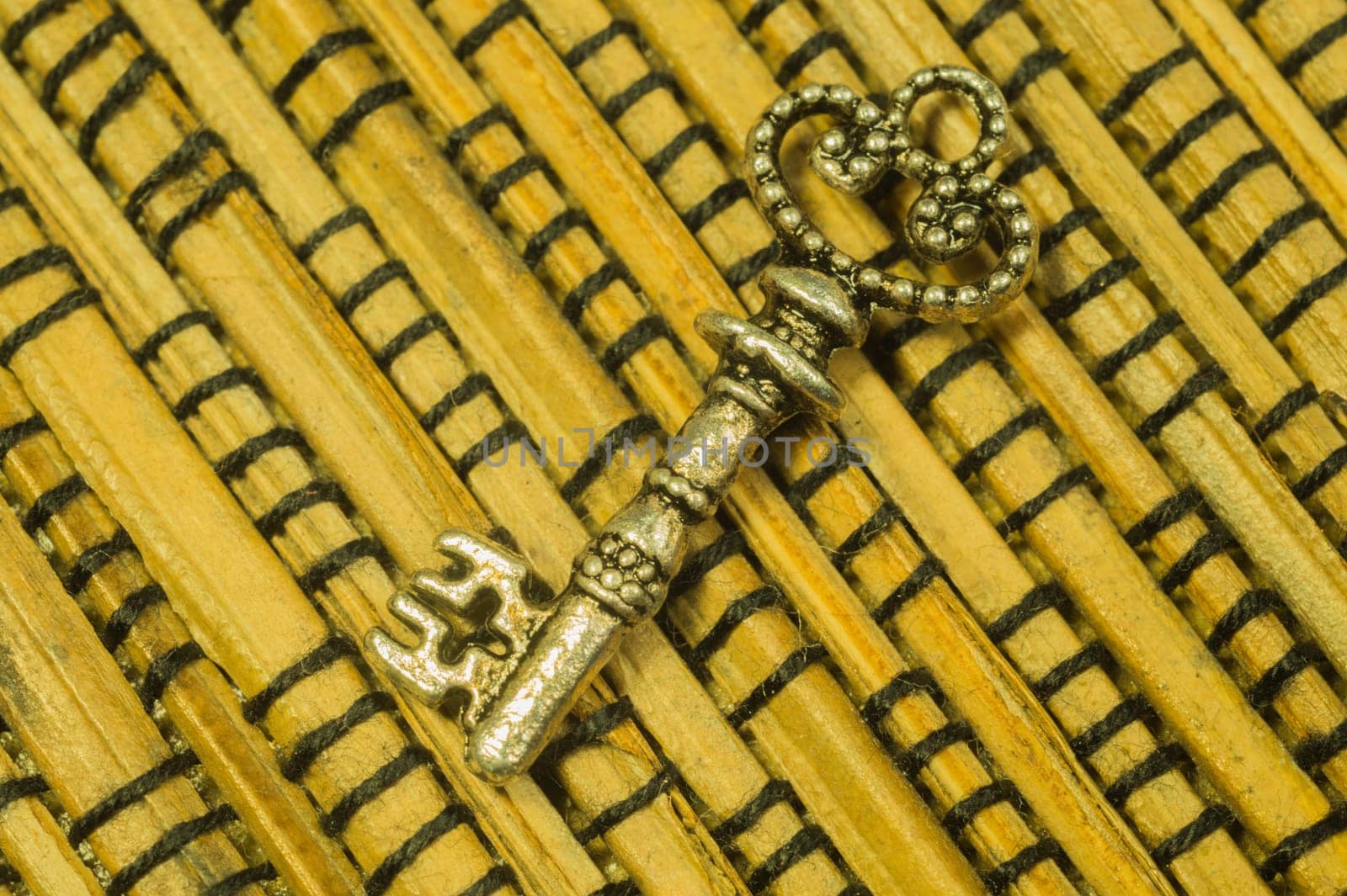 Vintage key on the wooden background. safety and security concept