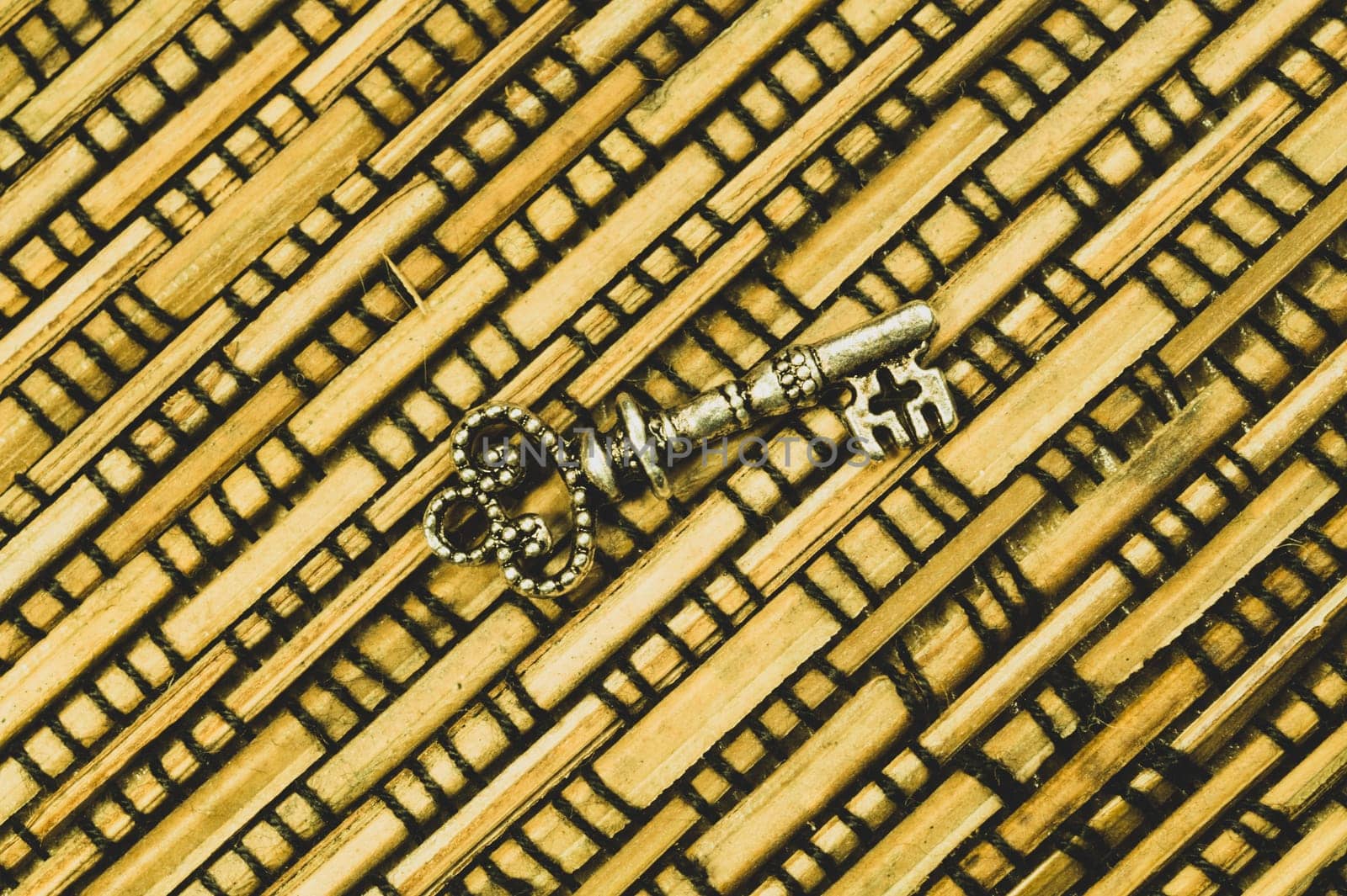 Vintage key on the wooden background. safety and security concept