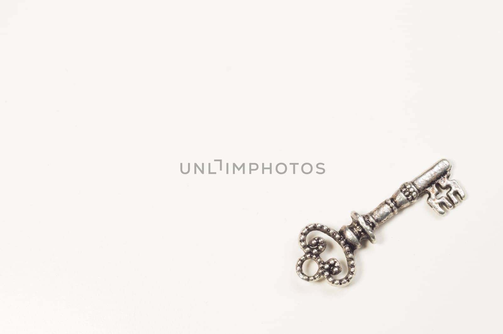 Vintage key isolated on white background. safety and security concept