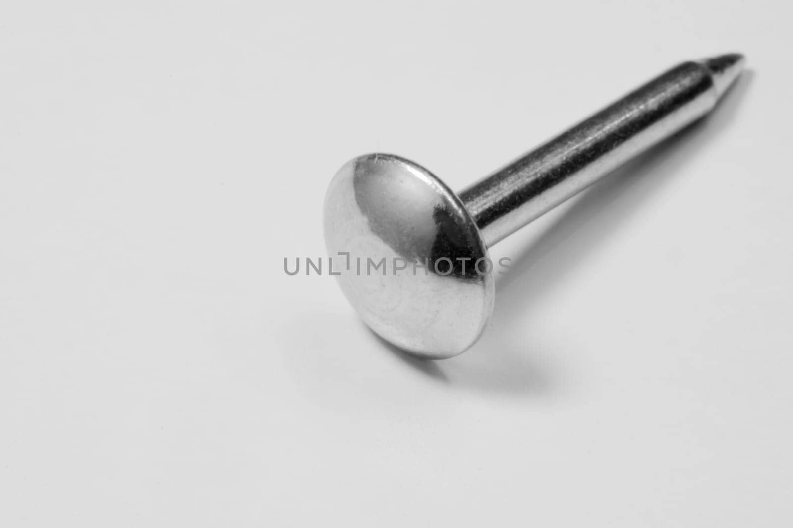 Metal nail isolated on white
