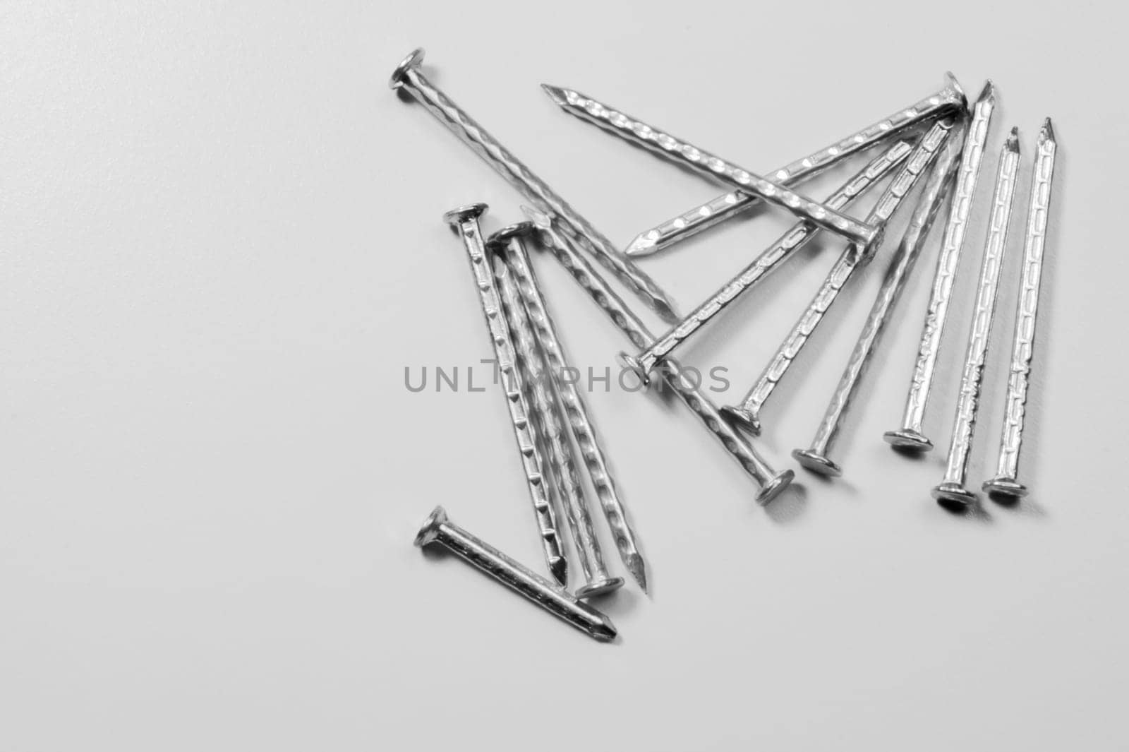 Metal nails isolated on white background
