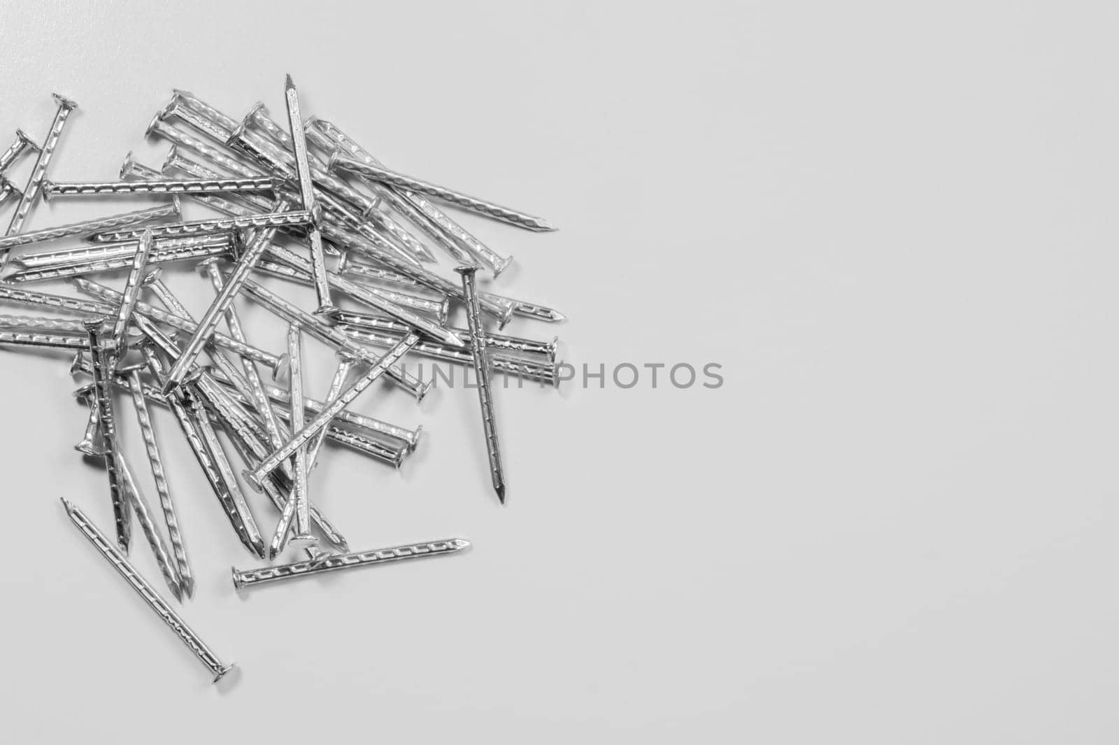 Metal nails isolated on white background