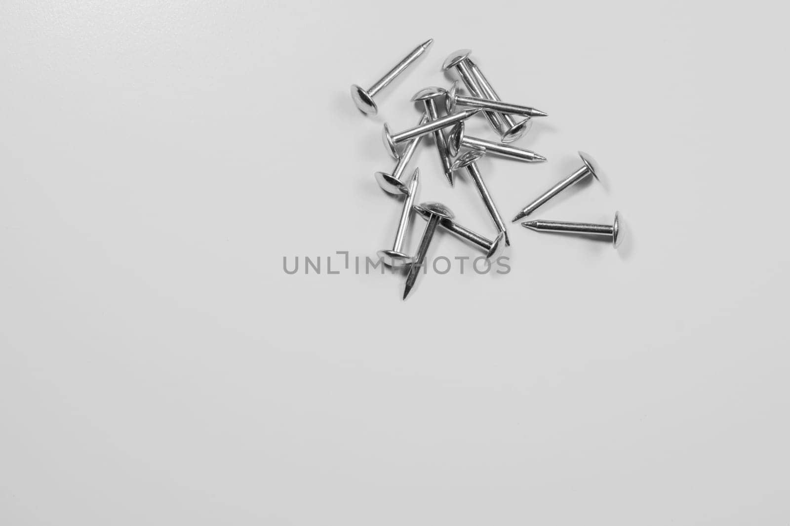 Metal nails isolated on white background