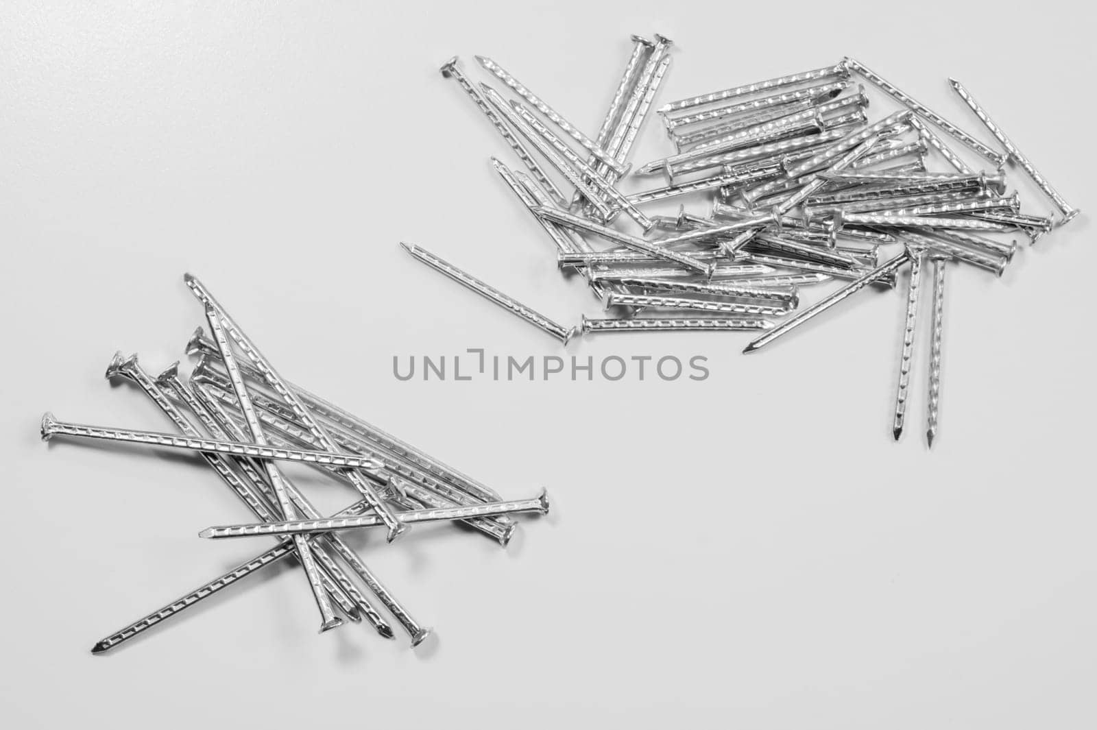Metal nails isolated on white background
