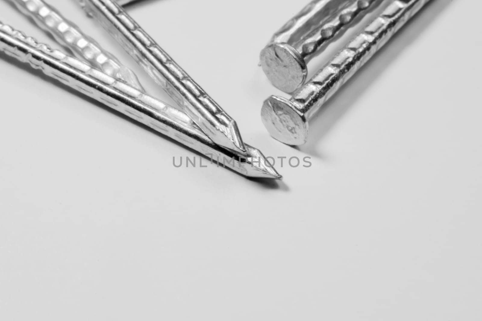 Metal nails isolated on white background