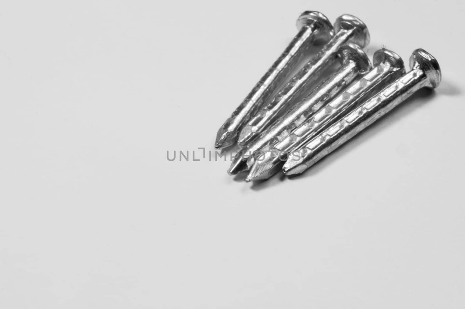 Metal nails isolated on white background