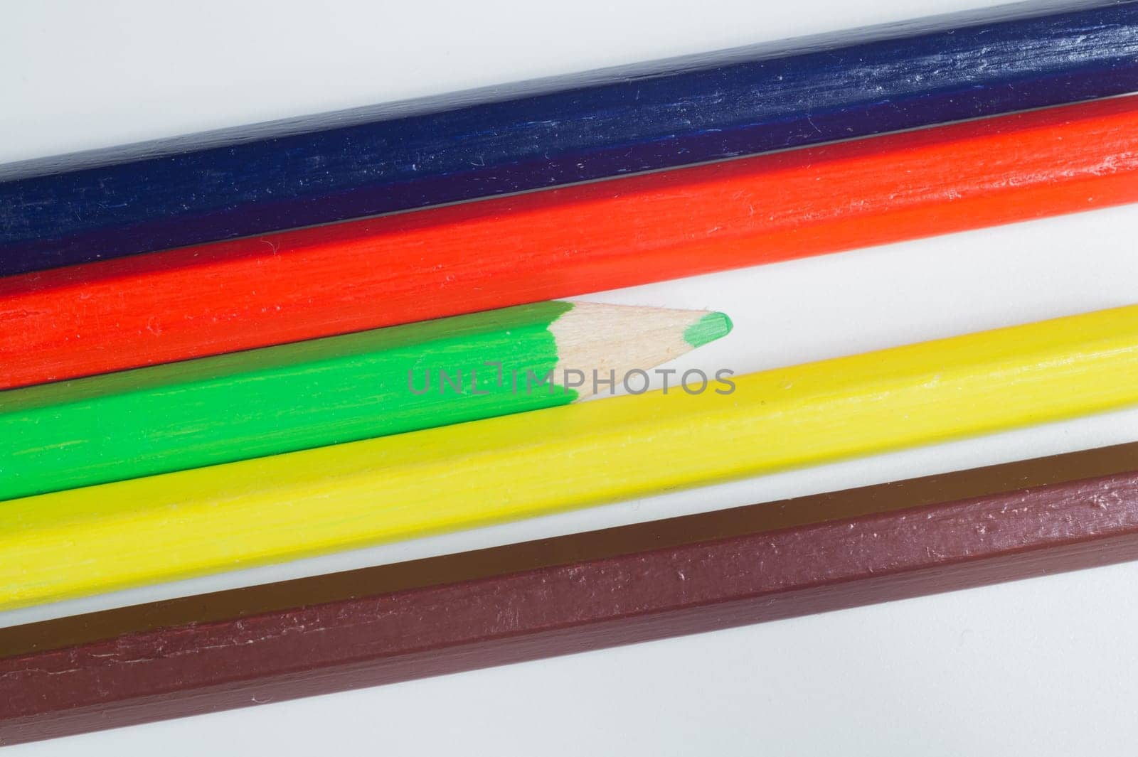 Colorful pencils isolated on white. drawing supplies