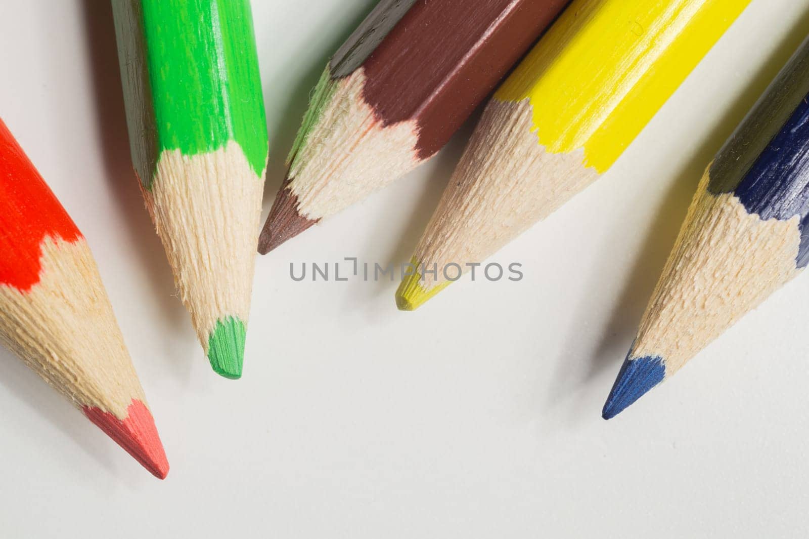 Colorful pencils isolated on white. drawing supplies