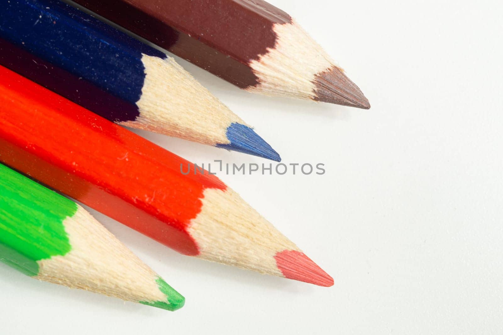 Colorful pencils isolated on white. drawing supplies