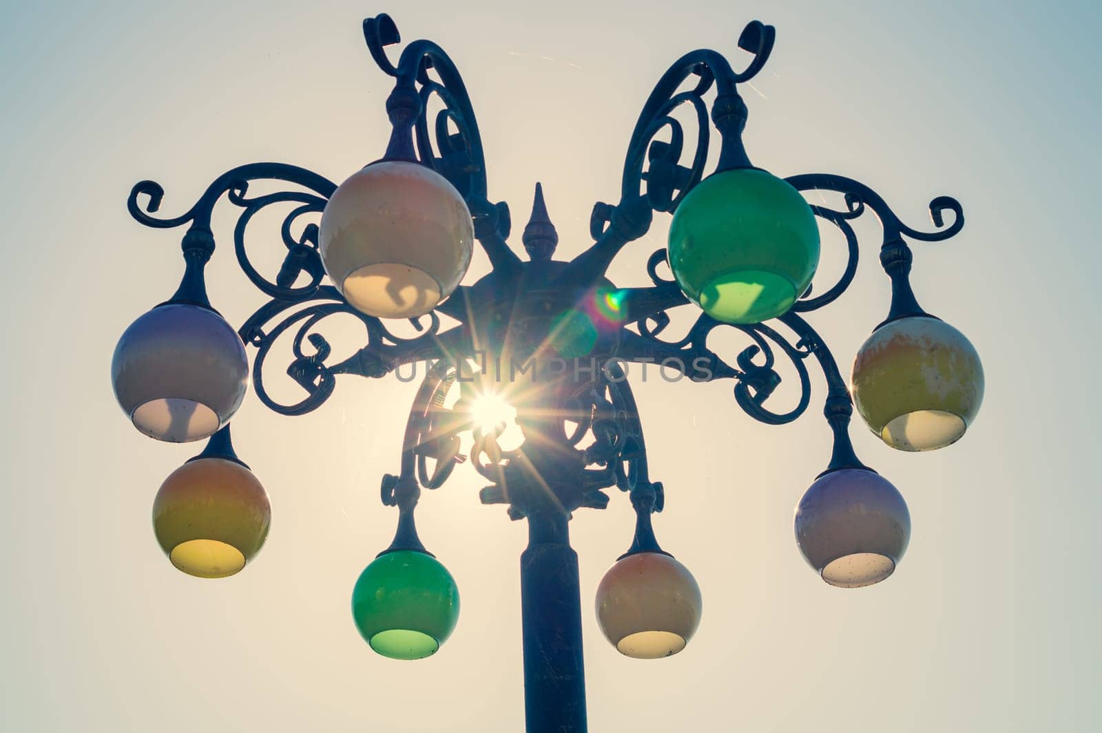 Vintage colorful street lamp against the sky. Retro lantern