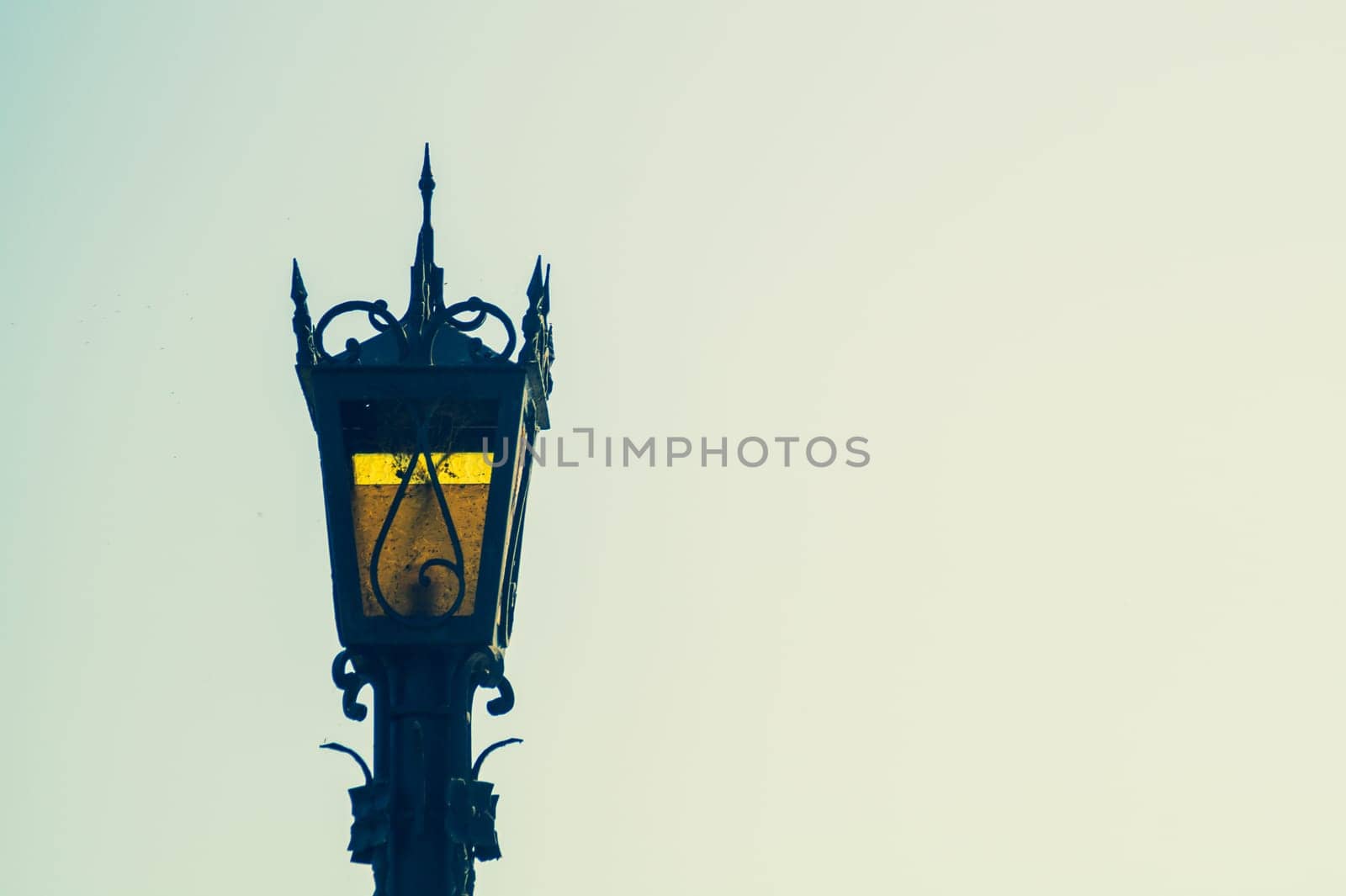 Vintage street lamp against the sky. Retro lantern. copy space