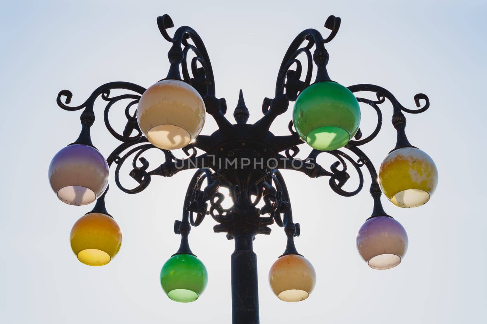 Vintage colorful street lamp against the sky. Retro lantern