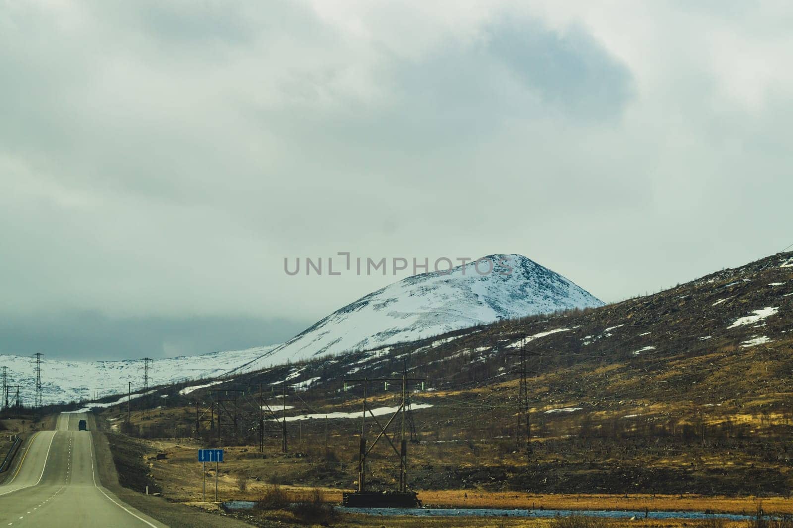 Mountain landscape background. snowy hills and forest background