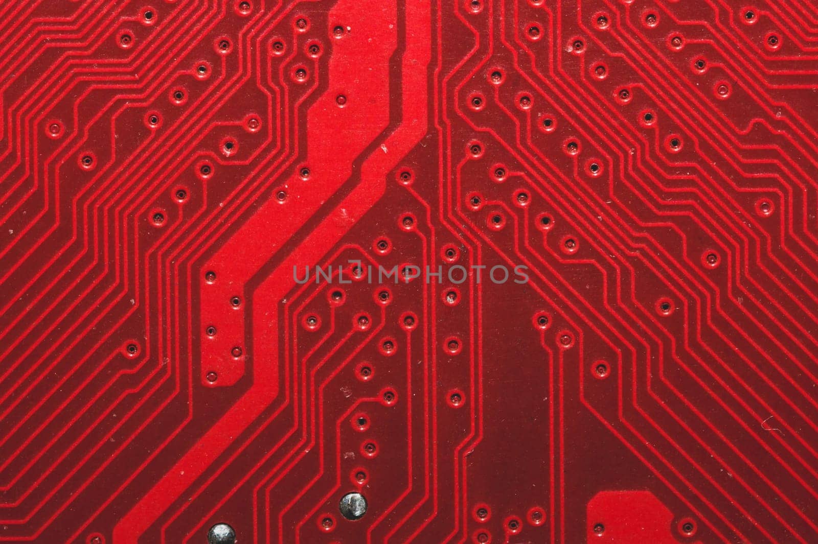 Spoiled motherboard close up. circuit board with dust and defects. modern technologies. micro elements of computer with connections and traces. Intelligent technology abstract background