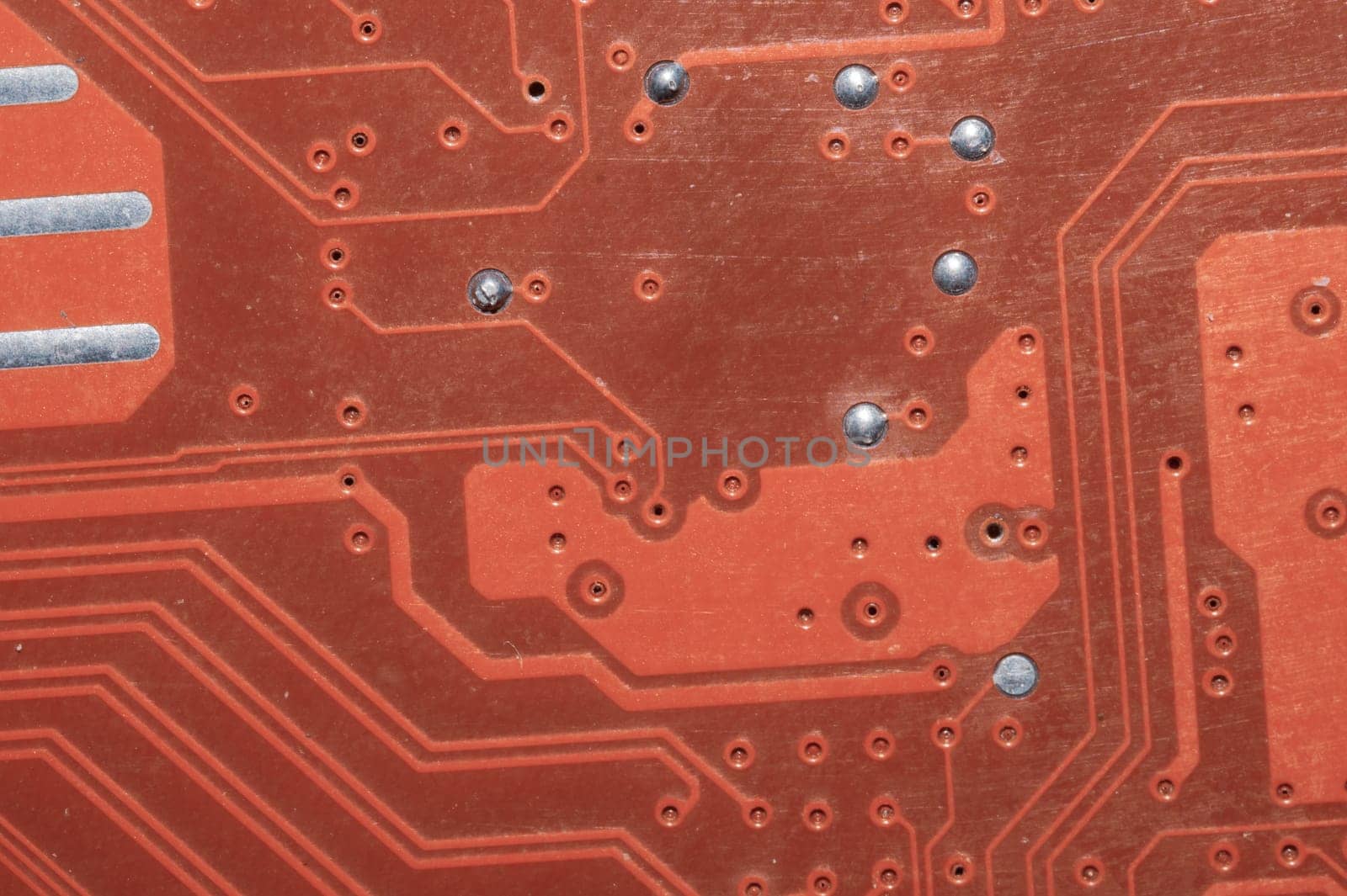 Spoiled motherboard close up. circuit board with dust and defects. modern technologies. micro elements of computer with connections and traces. Intelligent technology abstract background