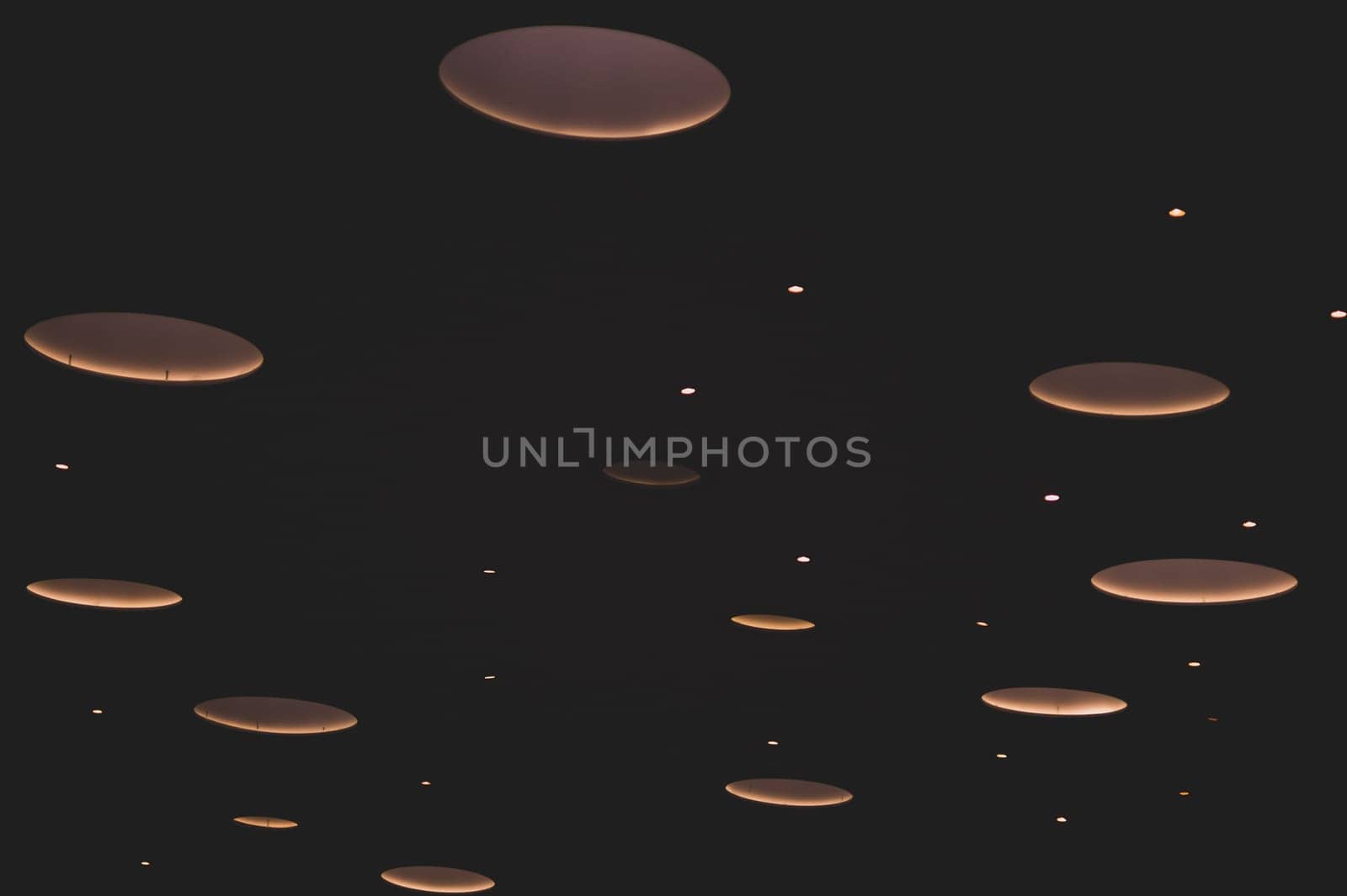 Sparkling lights on a black background. abstract backdrop with blinking lights