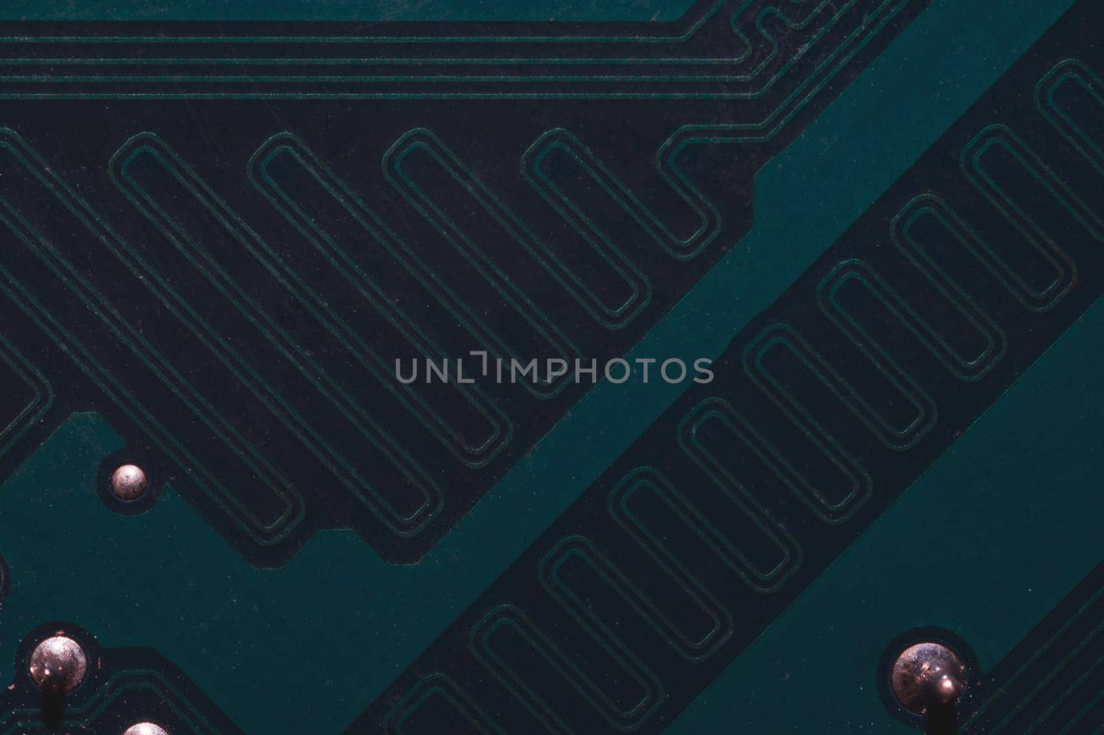 Dusty circuit board. computer motherboard close up. modern technologies. micro elements of computer with connections and traces. Intelligent technology abstract background