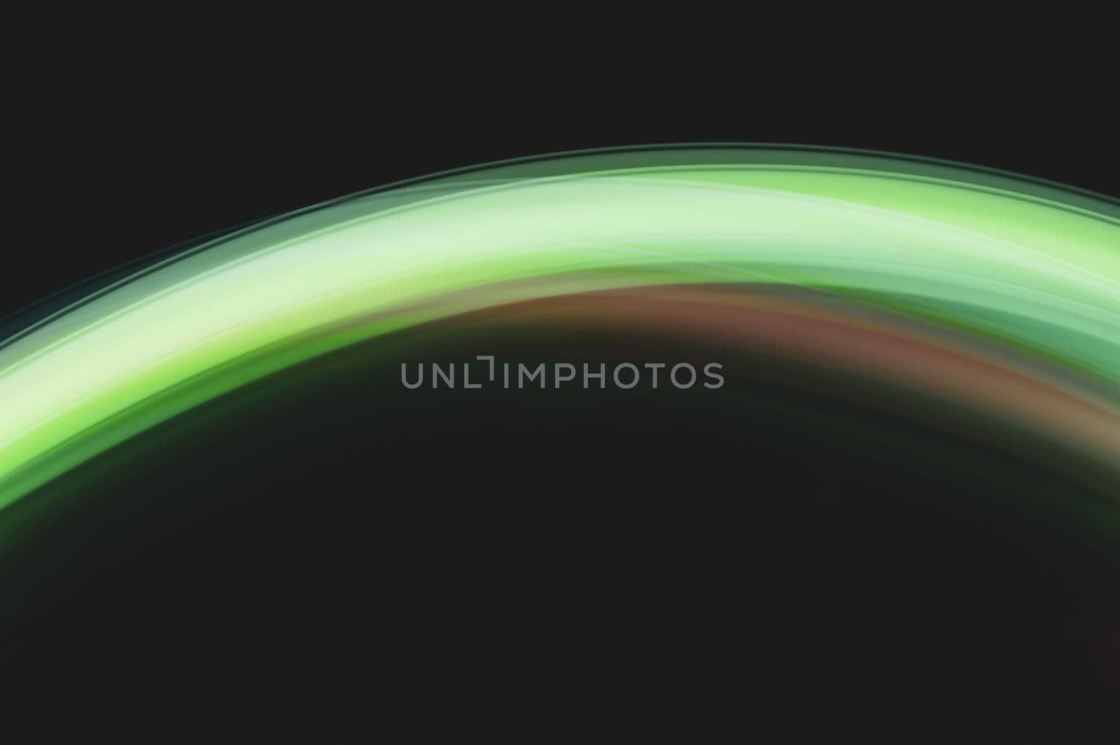 Colorful light traces with long exposure in the dark. abstract blurred lights background