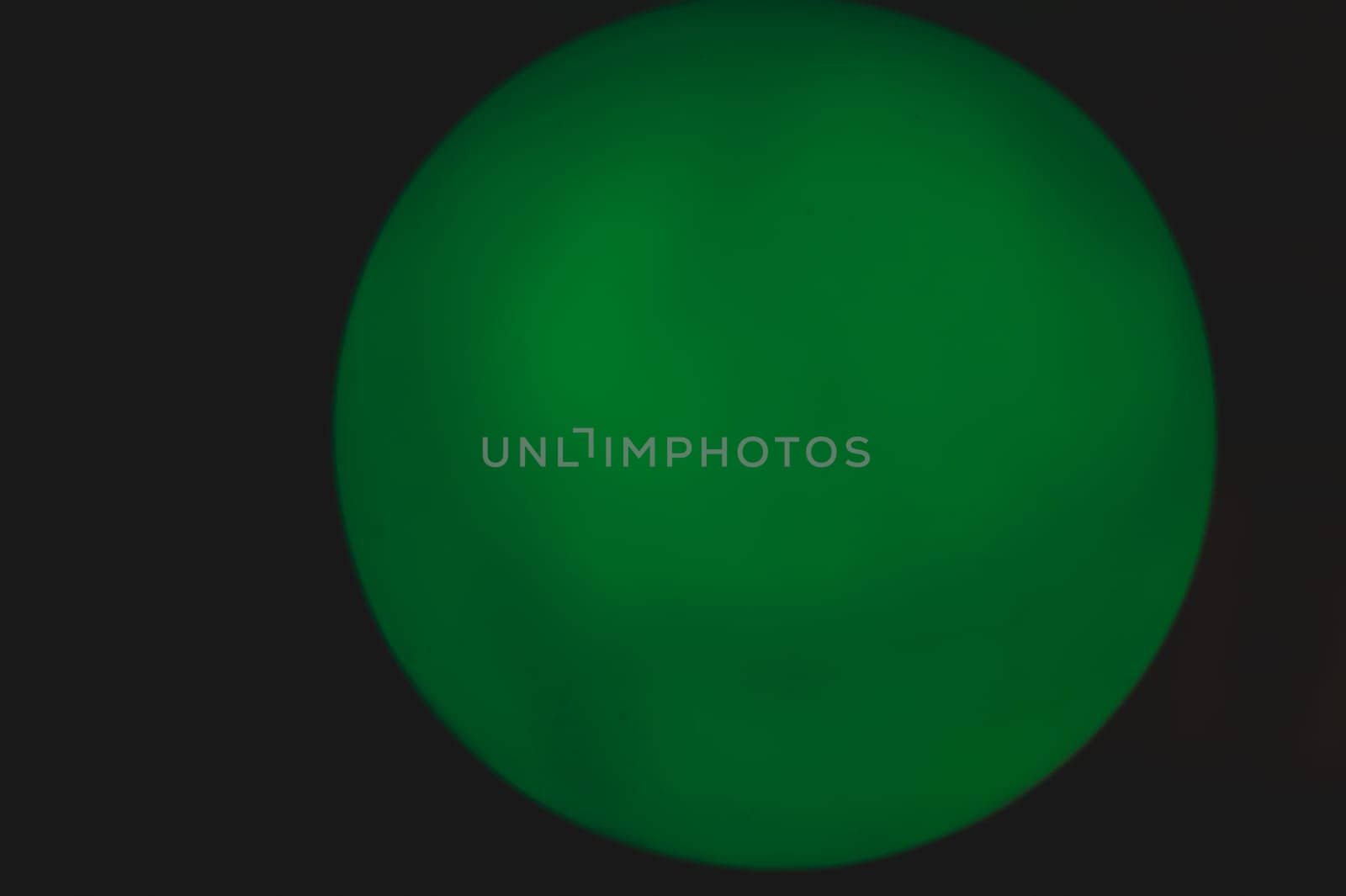 Glowing sphere in the dark. round template with color backlit