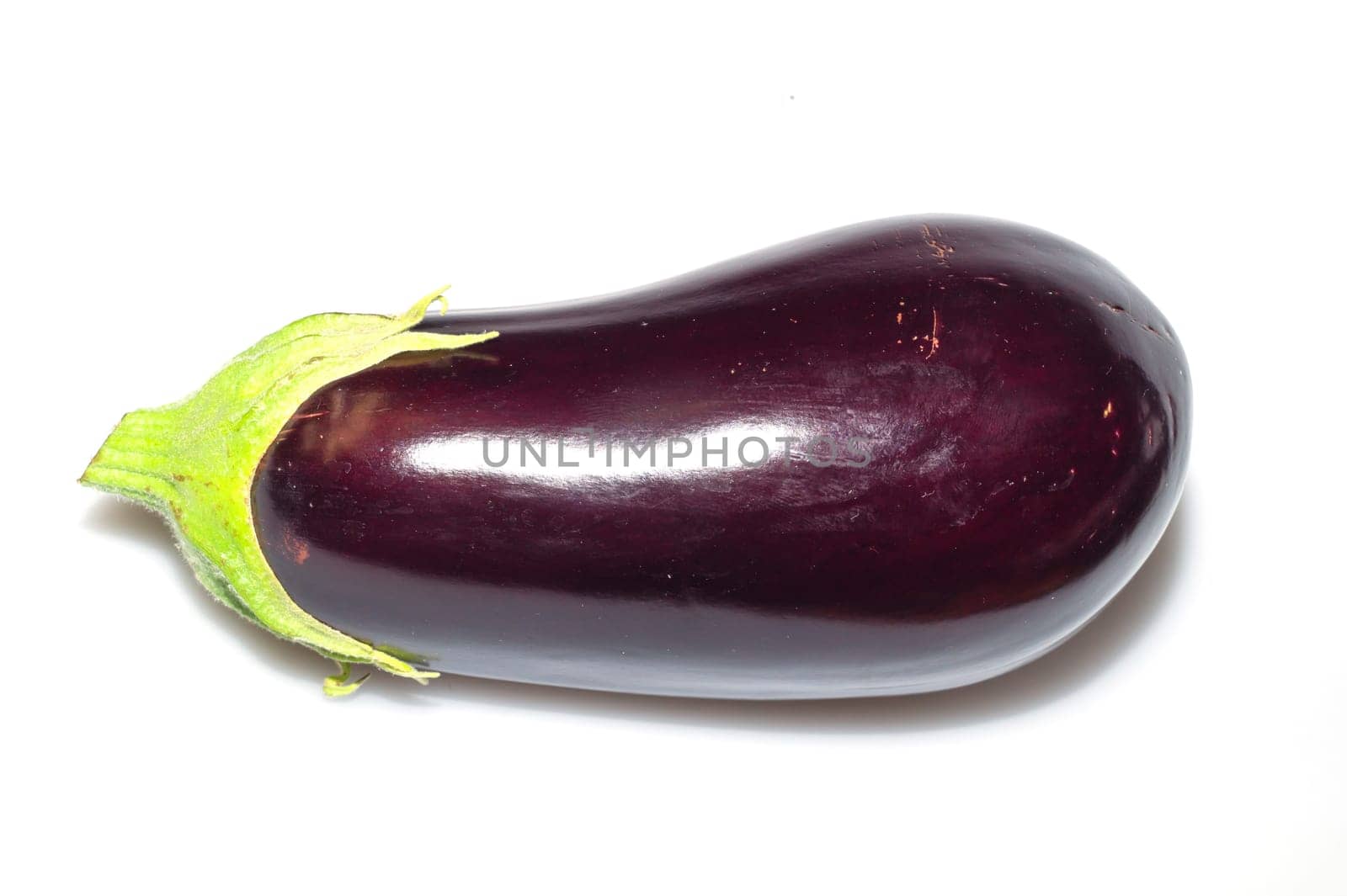 Natural looking eggplant isolated on white. fresh vegetable