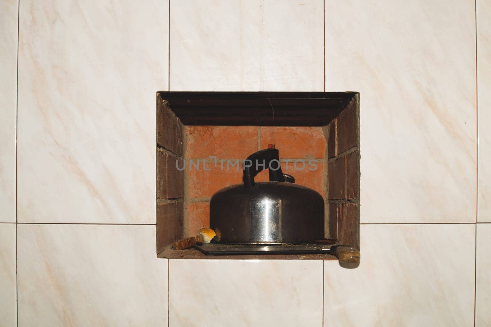 Old aluminium kettle. still life in rustic kitchen