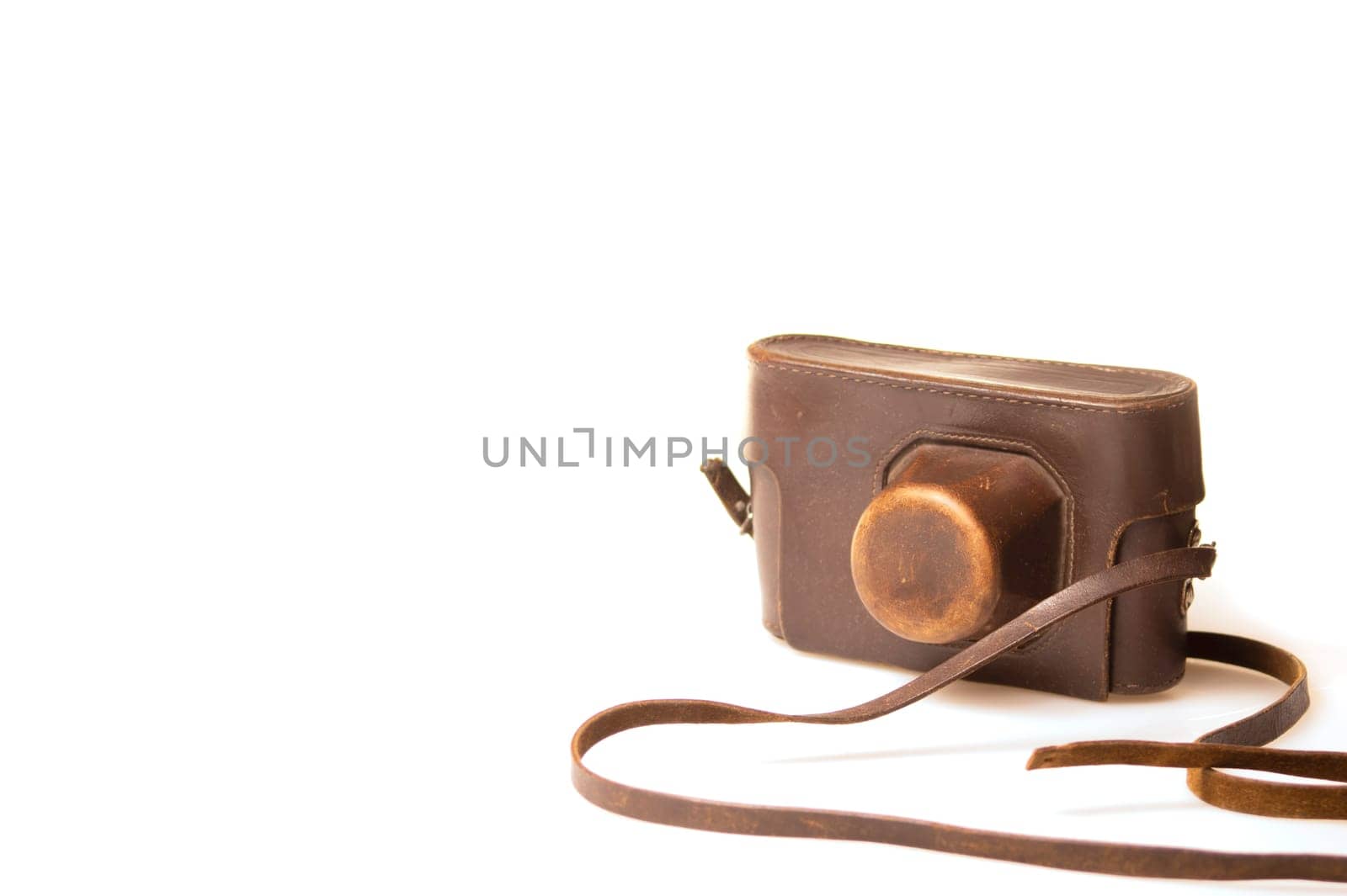 Old camera in brown leather case