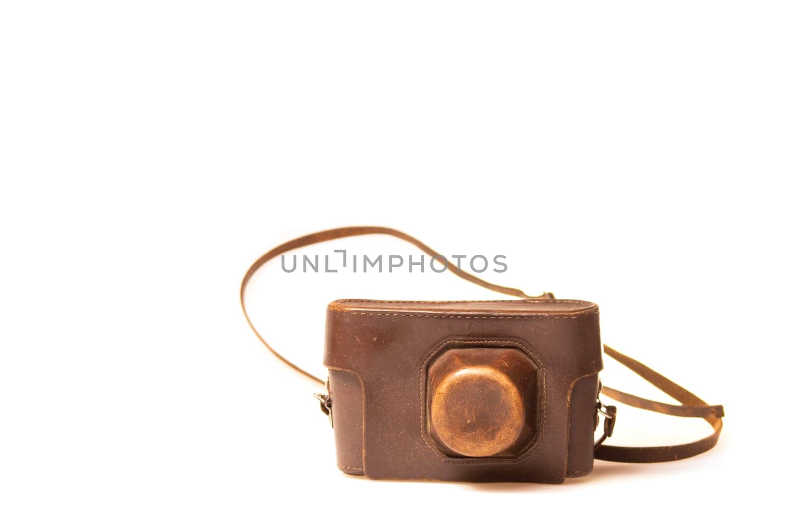 Old camera in brown leather case