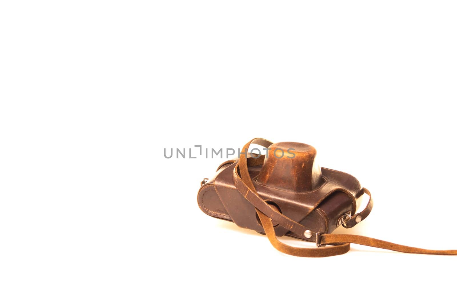 Old camera in brown leather case