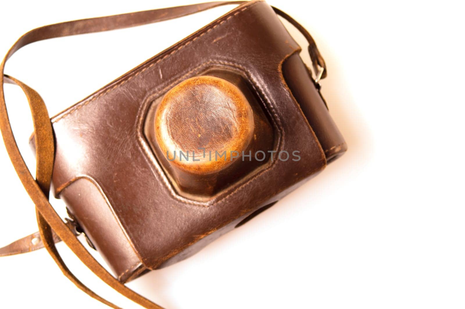 Old camera in brown leather case